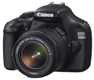 Цифровой фотоаппарат Canon EOS 1100D Kit EF-S 18-55mm DC III (s/ n:203073060227) пробег 37840 кад Б/ У